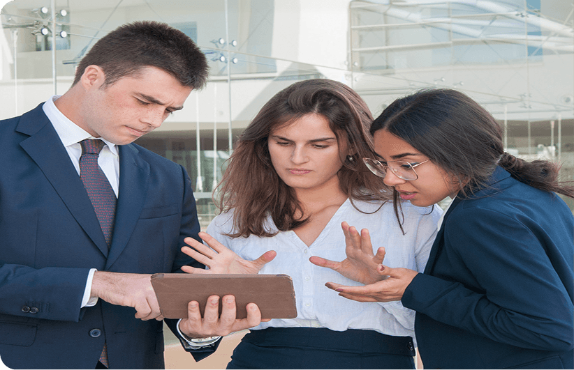 Team members collaborating on AI adoption strategy
